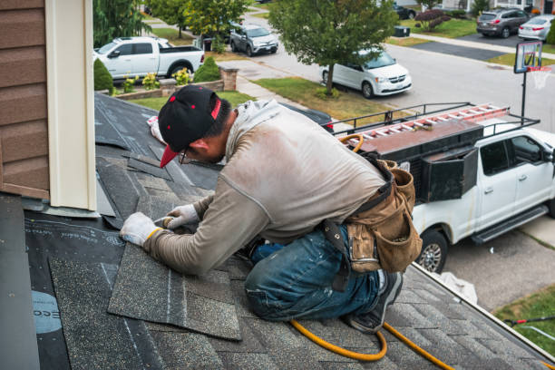 Professional Roof Replacement technician working in Nahant, MA